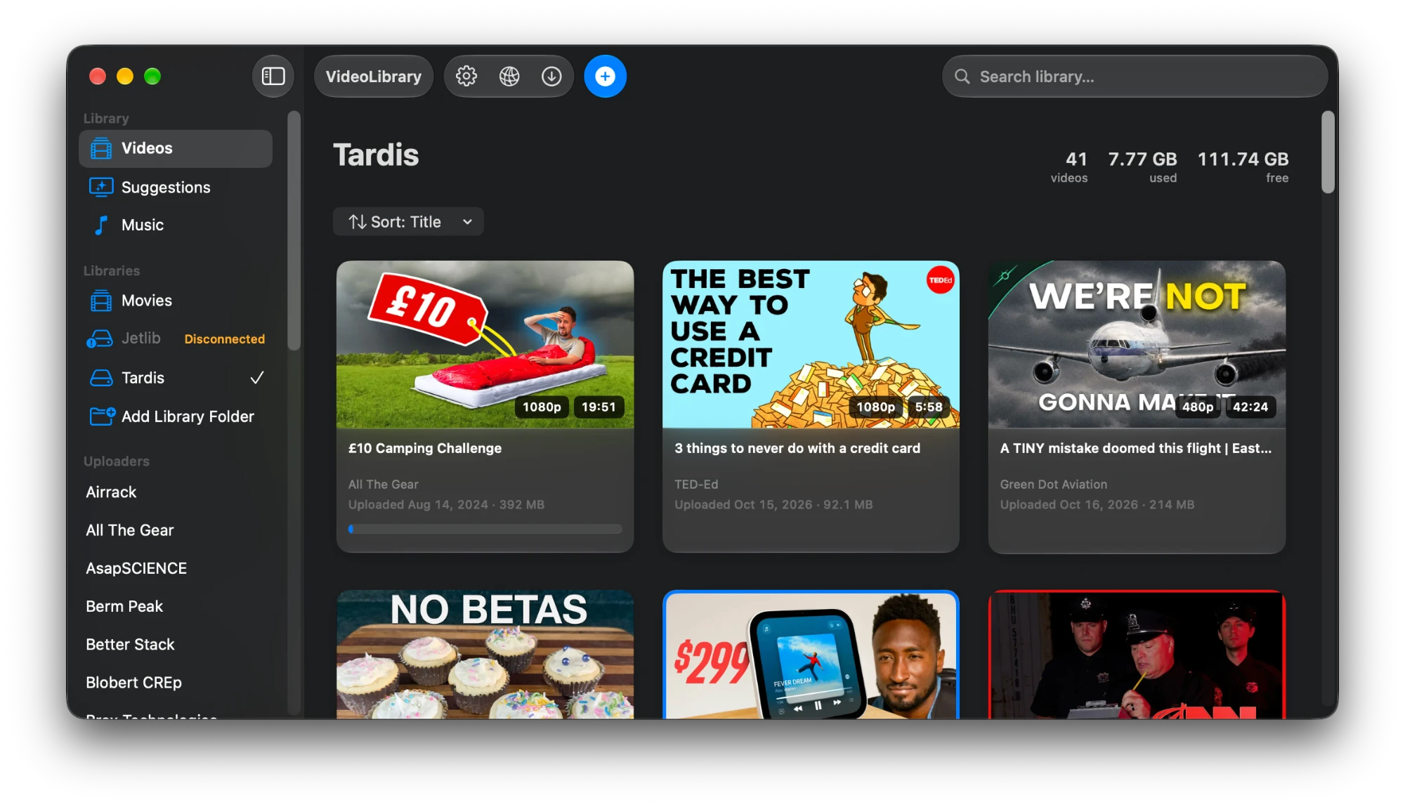 The VideoLibrary window: a sidebar of libraries and uploaders next to a grid of downloaded videos with resolution and length badges.